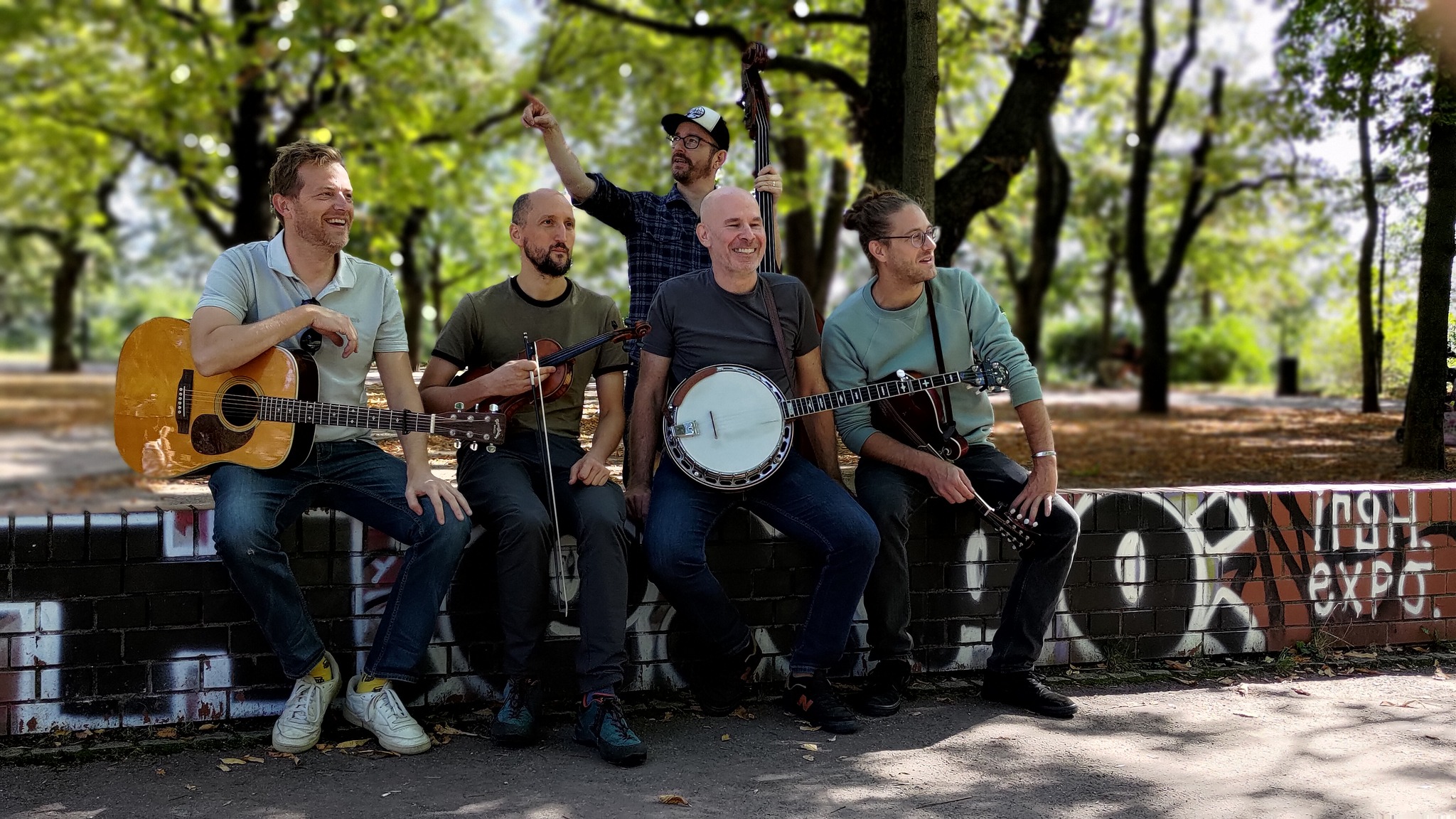 The Renegade String Band in a park in Prague